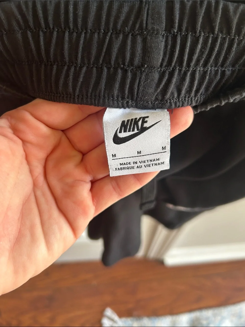 Nike Black Athletic Shorts with White Swoosh Boys Medium